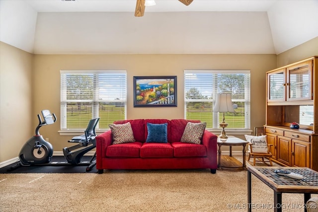 15065 N 148th Ave E, Collinsville, OK 74021 - living area featuring vaulted ceiling, plenty of natural light, baseboards, and a ceiling fan