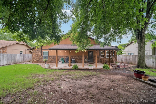 2630 W Boston Pl, Broken Arrow, OK 74012 - rear view of property featuring stone siding and a patio