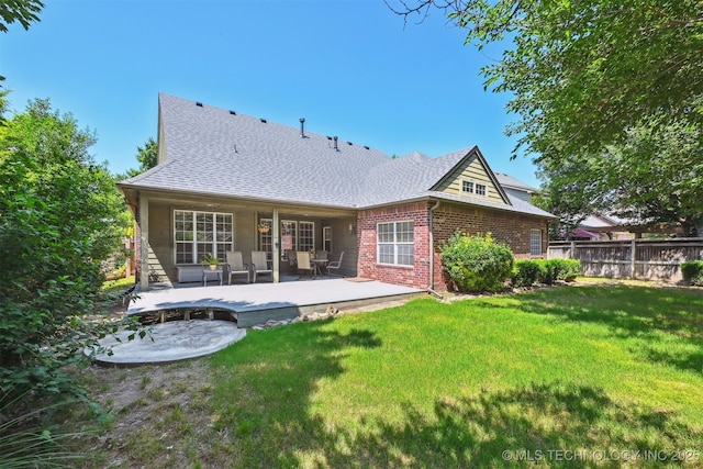 11715 S 93rd E Ave, Bixby, OK 74008 - rear view of house featuring brick siding, a shingled roof, and a patio