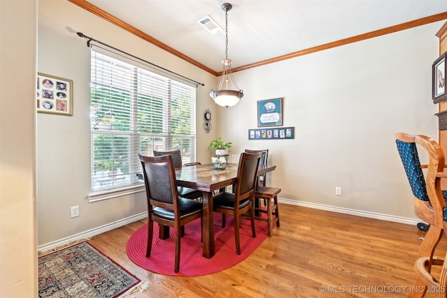11715 S 93rd E Ave, Bixby, OK 74008 - dining room featuring healthy amount of natural light, light wood-style floors, and ornamental molding