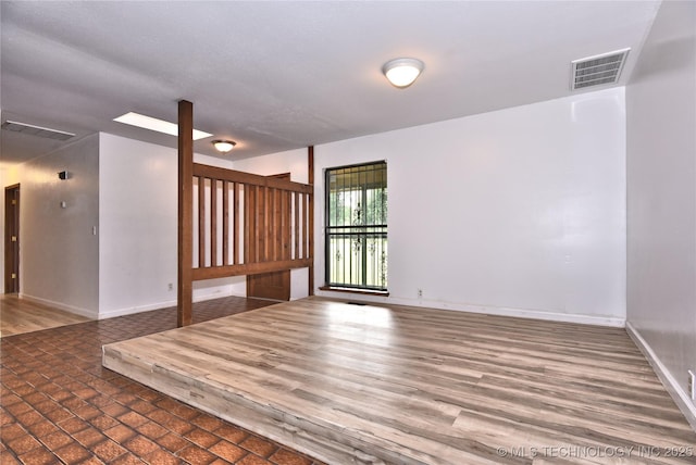 134 Spunky Creek Dr, Catoosa, OK 74015 - empty room featuring baseboards and brick patterned floors