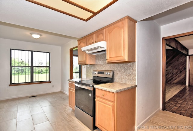 134 Spunky Creek Dr, Catoosa, OK 74015 - kitchen featuring stainless steel range with electric cooktop, under cabinet range hood, light brown cabinets, and light countertops