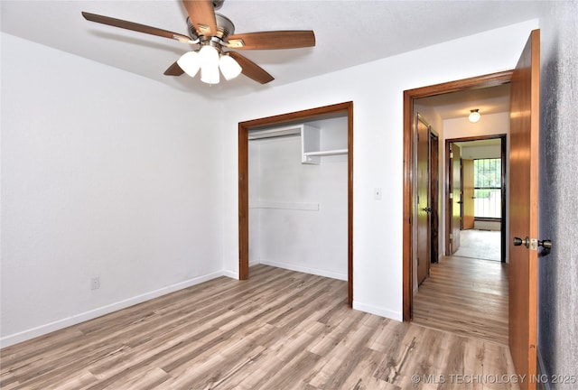 134 Spunky Creek Dr, Catoosa, OK 74015 - unfurnished bedroom featuring light wood-type flooring, a closet, baseboards, and ceiling fan