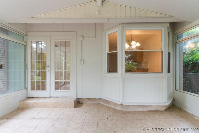 349 S 185th E Ave, Tulsa, OK 74108 - unfurnished sunroom featuring french doors, lofted ceiling, and a chandelier
