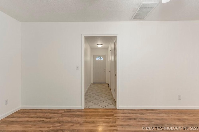 349 S 185th E Ave, Tulsa, OK 74108 - empty room featuring light wood-style flooring and baseboards
