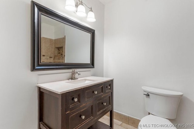 349 S 185th E Ave, Tulsa, OK 74108 - full bath featuring vanity, toilet, tile patterned flooring, and a shower