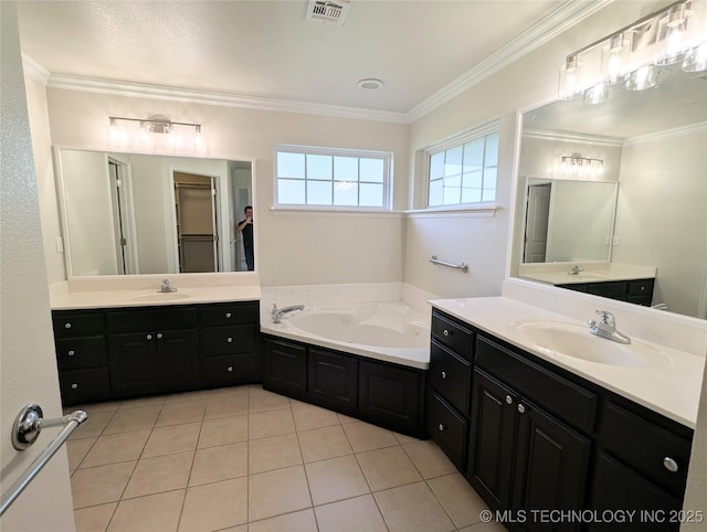 7870 N 163rd E Ct, Owasso, OK 74055 - bathroom featuring a garden tub, two vanities, tile patterned flooring, and ornamental molding