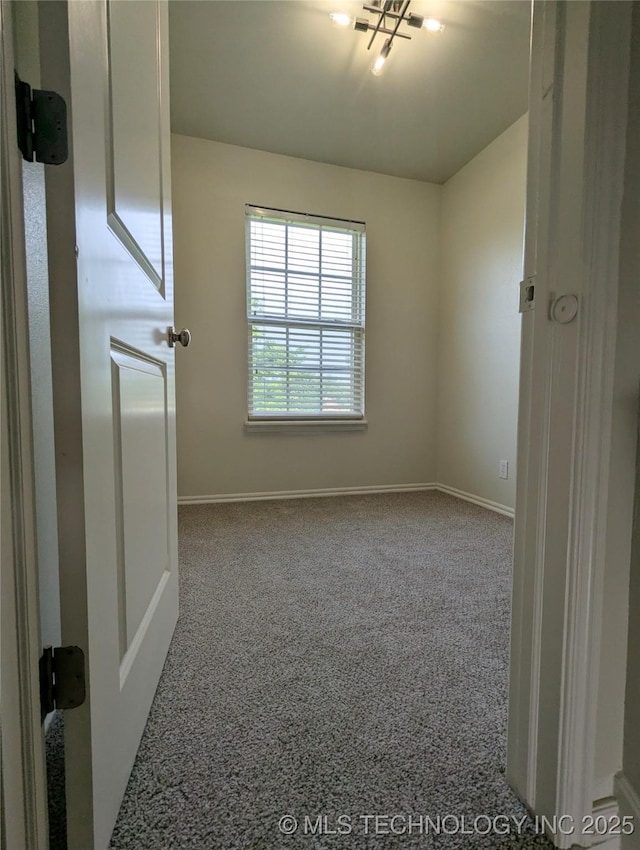 7870 N 163rd E Ct, Owasso, OK 74055 - spare room featuring baseboards and carpet floors