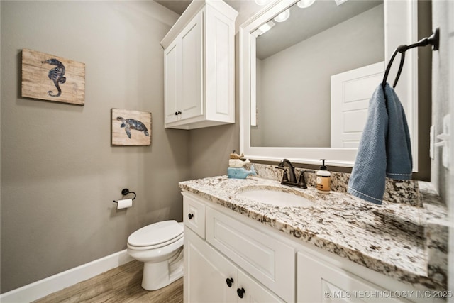 602 E 130th St S, Jenks, OK 74037 - bathroom featuring vanity and wood finished floors