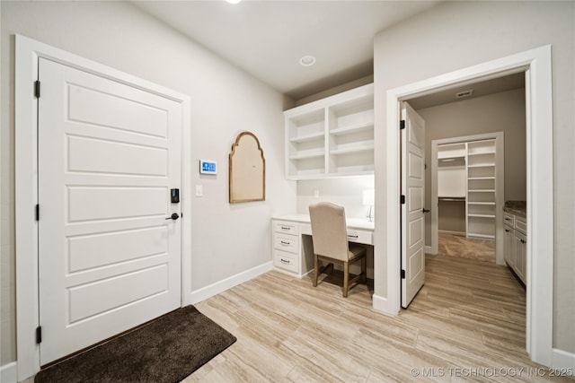 602 E 130th St S, Jenks, OK 74037 - office space featuring light wood-style flooring and built in study area