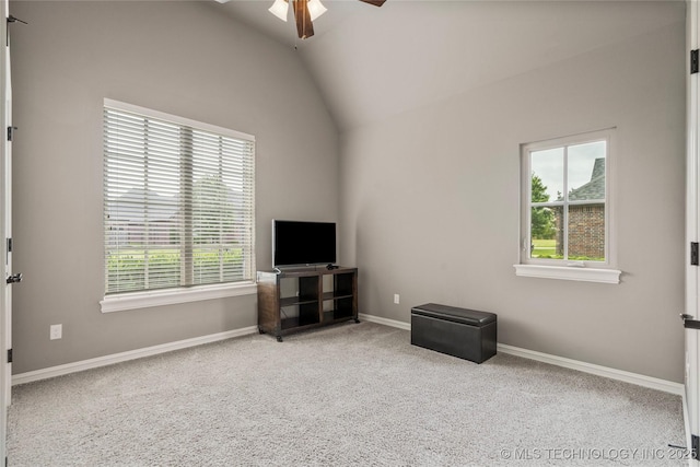 12934 S 2nd St, Jenks, OK 74037 - unfurnished living room featuring a ceiling fan, plenty of natural light, carpet, vaulted ceiling, and baseboards