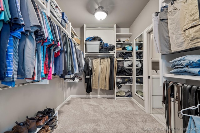 12934 S 2nd St, Jenks, OK 74037 - walk in closet featuring washing machine and clothes dryer and carpet flooring