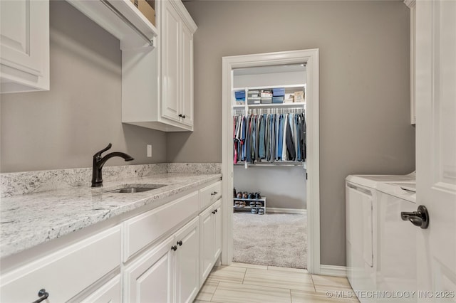 12934 S 2nd St, Jenks, OK 74037 - laundry room featuring cabinet space, washing machine and clothes dryer, light colored carpet, and baseboards