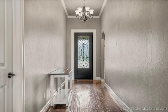 12934 S 2nd St, Jenks, OK 74037 - doorway to outside featuring arched walkways, dark wood-style floors, a chandelier, crown molding, and baseboards