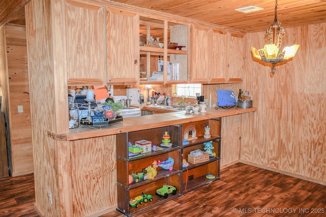 919 N 4210th Rd, Hugo, OK 74743 - kitchen featuring light brown cabinetry, tile counters, dark wood-style floors, wooden ceiling, and a chandelier