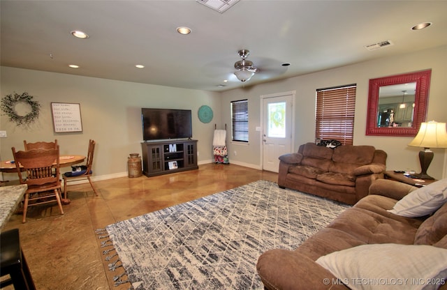 2430 S 31st St E, Muskogee, OK 74403 - tiled living room featuring a ceiling fan, baseboards, and recessed lighting