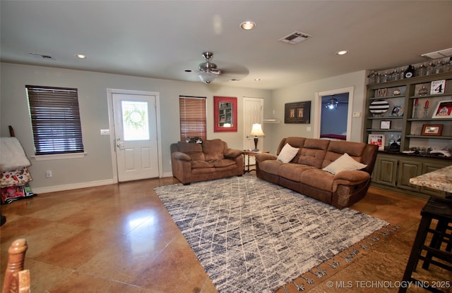 2430 S 31st St E, Muskogee, OK 74403 - living room with a ceiling fan, recessed lighting, baseboards, and dark tile patterned floors