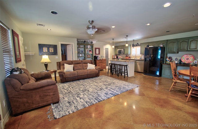 2430 S 31st St E, Muskogee, OK 74403 - living area featuring recessed lighting and light tile patterned floors