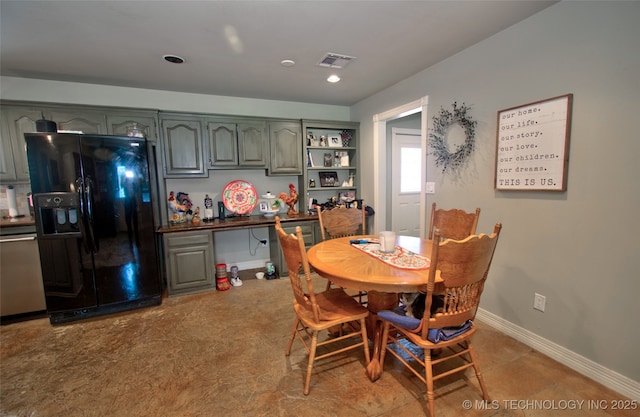 2430 S 31st St E, Muskogee, OK 74403 - dining area featuring baseboards and recessed lighting