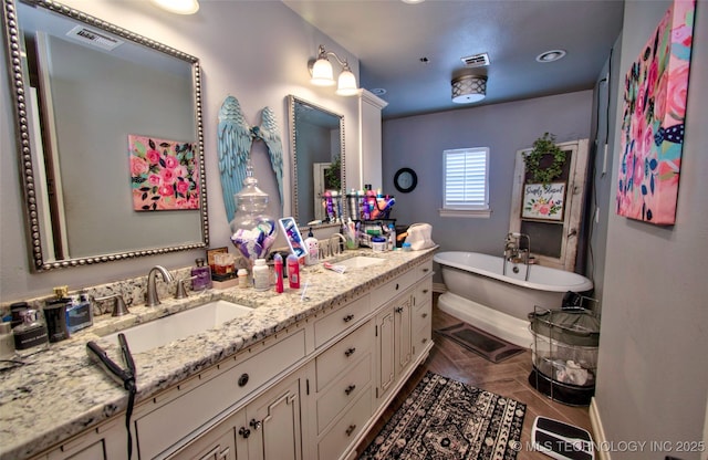 2430 S 31st St E, Muskogee, OK 74403 - bathroom featuring double vanity and a soaking tub