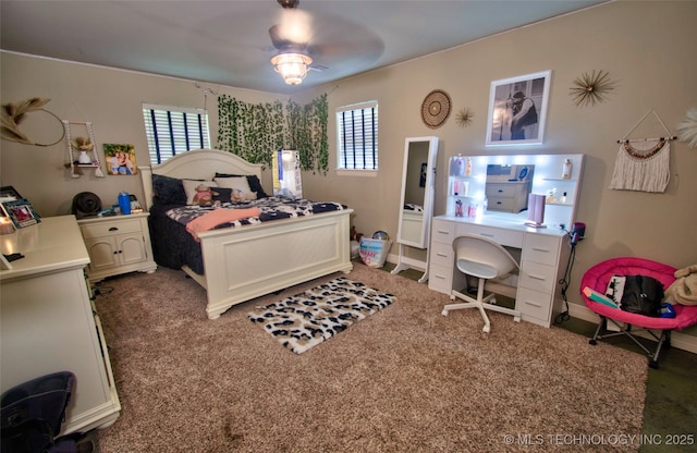 2430 S 31st St E, Muskogee, OK 74403 - carpeted bedroom featuring baseboards