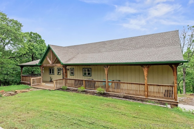 5687 Lake Jackson Rd, Mounds, OK 74047 - back of house featuring a yard and roof with shingles