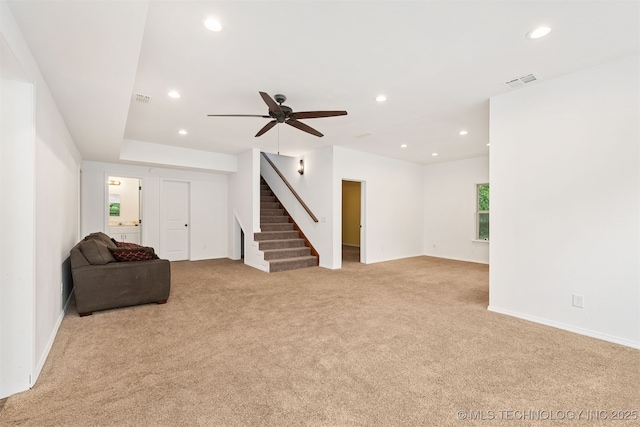 5687 Lake Jackson Rd, Mounds, OK 74047 - unfurnished living room with stairway, carpet, recessed lighting, a ceiling fan, and baseboards