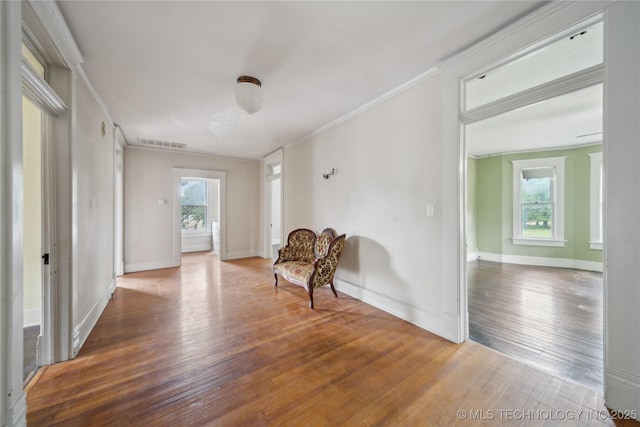 410 S Seminole Ave, Okmulgee, OK 74447 - unfurnished room with hardwood / wood-style flooring, crown molding, and baseboards