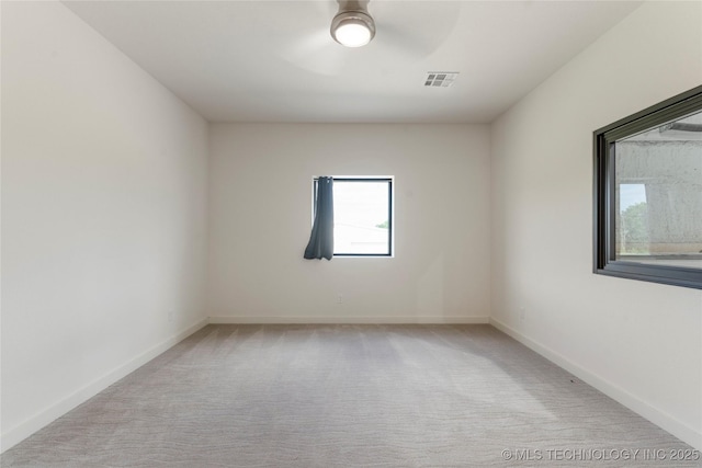 14382 Adams Rd, Mounds, OK 74047 - empty room with a ceiling fan and carpet flooring