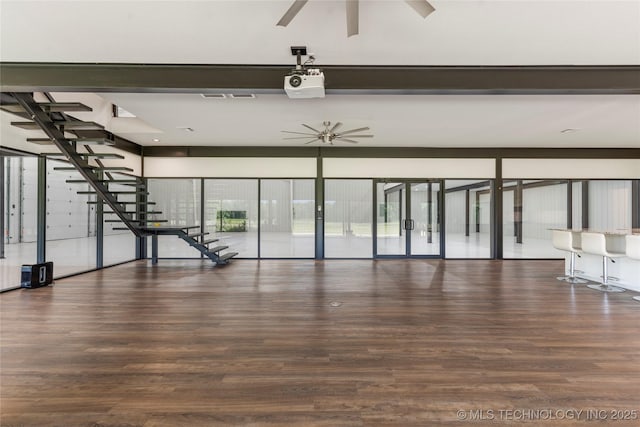 14382 Adams Rd, Mounds, OK 74047 - unfurnished living room with a ceiling fan, wood finished floors, and stairs