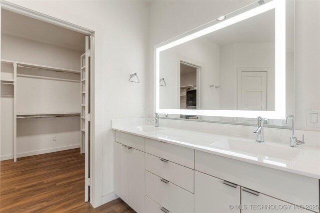 14382 Adams Rd, Mounds, OK 74047 - full bathroom featuring double vanity, wood finished floors, and a spacious closet
