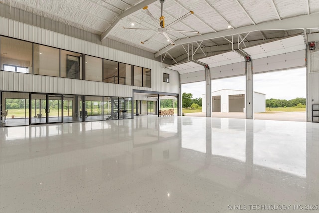 14382 Adams Rd, Mounds, OK 74047 - unfurnished room with high vaulted ceiling and speckle patterned floor