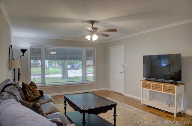 806 S New Haven Ave, Tulsa, OK 74112 - living area featuring ornamental molding, wood finished floors, ceiling fan, and baseboards