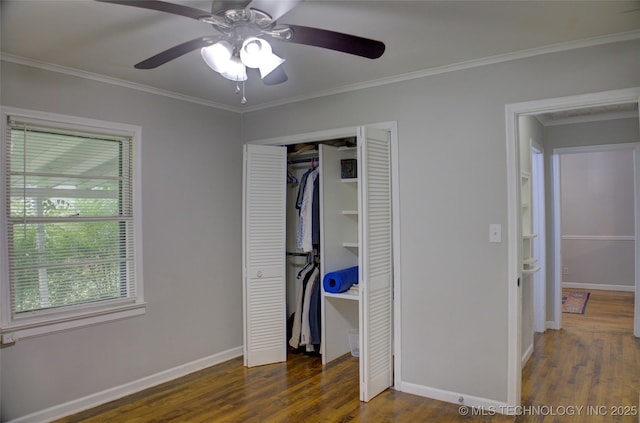 806 S New Haven Ave, Tulsa, OK 74112 - unfurnished bedroom with wood finished floors, ornamental molding, baseboards, a ceiling fan, and a closet