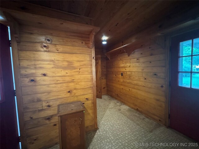 1524 W Maple St W, Durant, OK 74701 - hall featuring wooden ceiling and wood walls