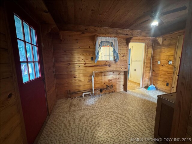 1524 W Maple St W, Durant, OK 74701 - spare room featuring wooden ceiling and wooden walls