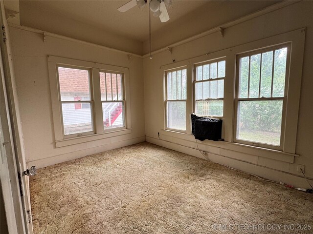 1524 W Maple St W, Durant, OK 74701 - spare room with light carpet and a ceiling fan