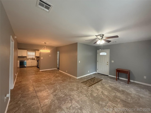 1618 Houston St, Muskogee, OK 74403 - entrance foyer featuring a ceiling fan and baseboards
