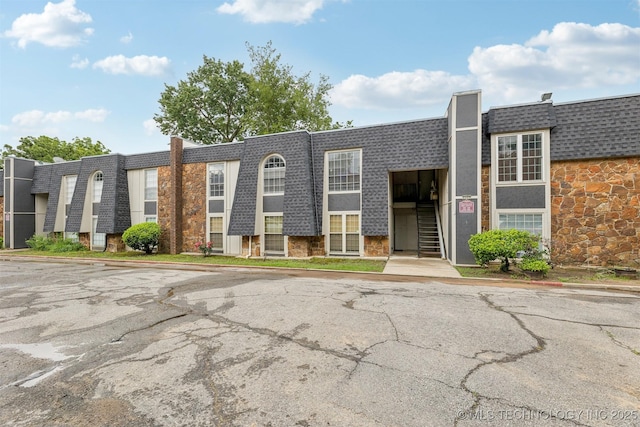 4440 68th St Unit 486, Tulsa, OK 74136 - view of building exterior featuring stairway