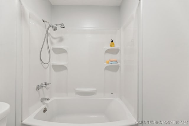 4440 68th St Unit 486, Tulsa, OK 74136 - bathroom featuring toilet and bathing tub / shower combination