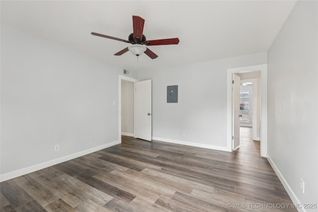 4440 68th St Unit 486, Tulsa, OK 74136 - unfurnished room with electric panel, ceiling fan, wood finished floors, and baseboards