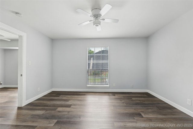 4440 68th St Unit 486, Tulsa, OK 74136 - spare room with a ceiling fan, a smoke detector, baseboards, and wood finished floors