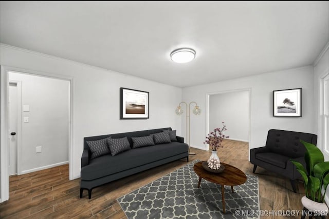5720 E 21st St, Tulsa, OK 74114 - living room with wood finished floors, ornamental molding, and baseboards
