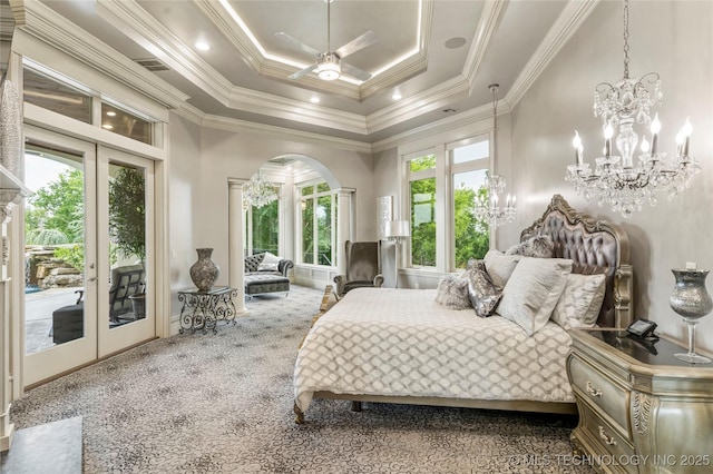 5879 N Eagle Summit Rd, Owasso, OK 74055 - bedroom with carpet, access to outside, arched walkways, french doors, and a tray ceiling