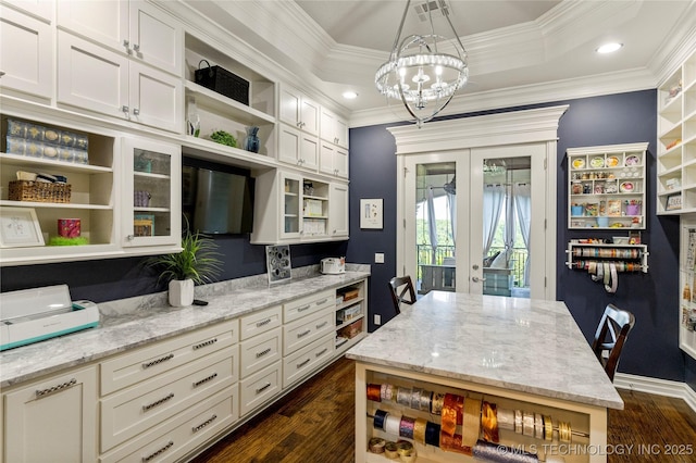 5879 N Eagle Summit Rd, Owasso, OK 74055 - kitchen featuring open shelves, french doors, dark wood finished floors, white cabinets, and crown molding