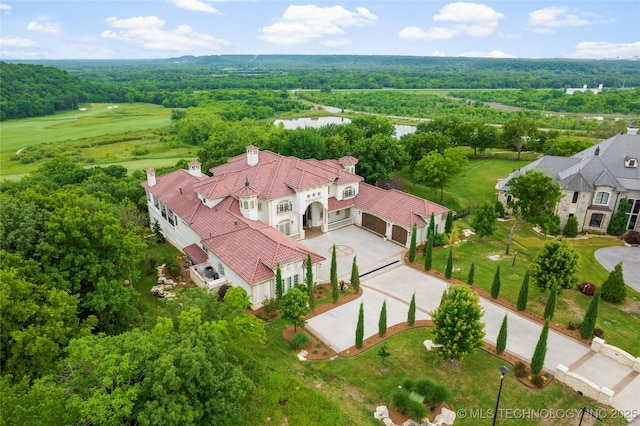 5879 N Eagle Summit Rd, Owasso, OK 74055 - drone / aerial view of a large body of water and a heavily wooded area