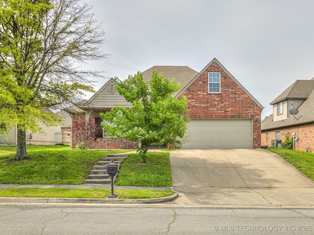 4610 E 142nd St S, Bixby, OK 74008 - traditional-style house featuring brick siding and driveway