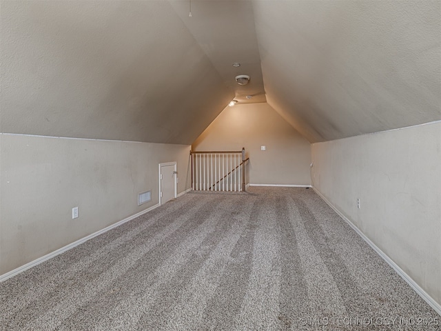 4610 E 142nd St S, Bixby, OK 74008 - additional living space featuring vaulted ceiling and carpet floors
