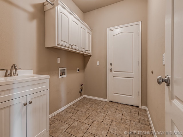 4610 E 142nd St S, Bixby, OK 74008 - laundry area featuring electric dryer hookup, washer hookup, cabinet space, light stone finish flooring, and hookup for a gas dryer