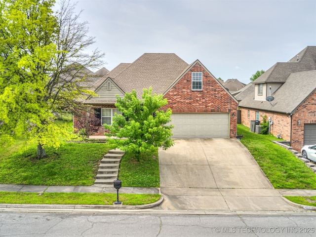 4610 E 142nd St S, Bixby, OK 74008 - traditional home with concrete driveway, brick siding, a front yard, and a garage